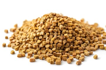 A pile of fenugreek on a white background. scattered and piled up in various sizes. Concept of abundance and variety.