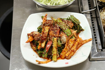 Korea style food. Raw Oyster spicy sauce Salad