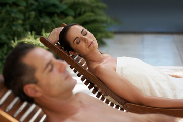 Man, woman and couple relax on travel, vacation and holiday at resort, hotel and lodge in San...