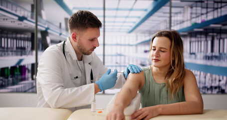 Doctor Making Vaccine Injection