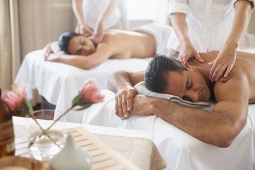 Spa, back massage to relax and couple with masseuse for luxury pamper treatment together. Beauty,...