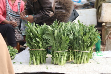 Green organic vegetables at the local market in Laos.