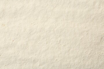 Texture of baking powder as background, top view
