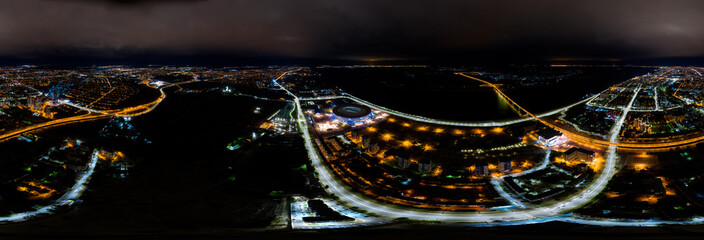 Volgograd, Russia - September 19, 2020: ROTOR Stadium. Aerial view at night. Panorama 360
