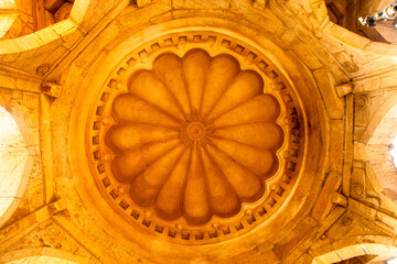 Warm toned dome ceiling architecture at Mandu, India.