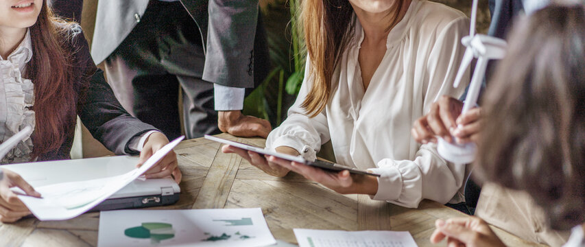 Corporate Team Analyzing Data