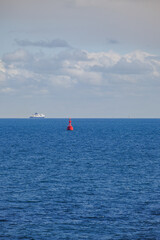 Passenger pax roro ro-ro car ferry cruiseship cruise ship liner at sea with scenic maritime coastal...