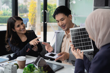 Businessman team using tablet for working technology and business,  Renewable energy-based green...