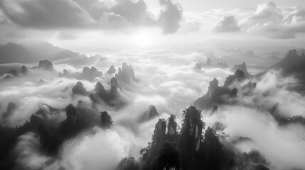 The ethereal beauty of china mountains landscape, is immersed in a captivating sea of clouds. The mystical atmosphere transforms the landscape into an enchanting wonderland, Black and White