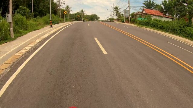 January 14, 2024 - Rawai, Phuket Thailand. Driving through Rawai and up to Windmill View Point just before sunset.