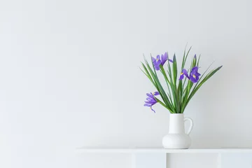 Poster Im Rahmen irises in white jug on white background © Maya Kruchancova