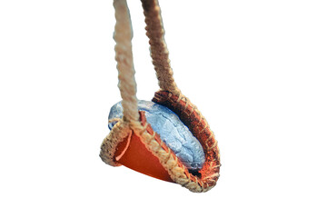 Roman slingshot of leather Vintage weapons for throwing metal shells and stones, isolated on a...