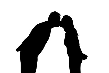 Silhouette of kissing man and woman, isolated on a white background. Couple husband and wife, love in the evening light of the home living room