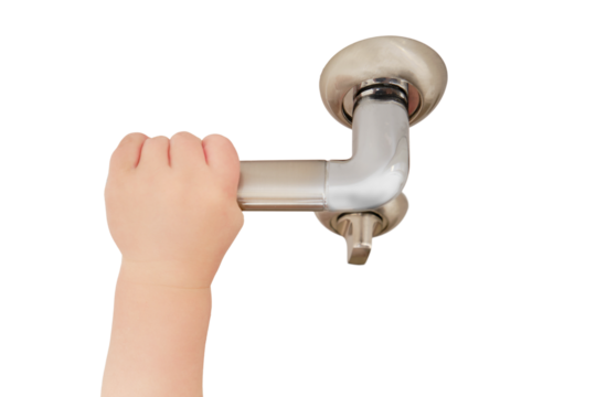Toddler baby opens the door holding the door handle, child hand close-up, isolated on a white background. White wooden door, metal door handle and baby hand