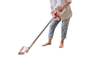Woman with a wireless portable vacuum cleaner in the kitchen, isolated on a white background....