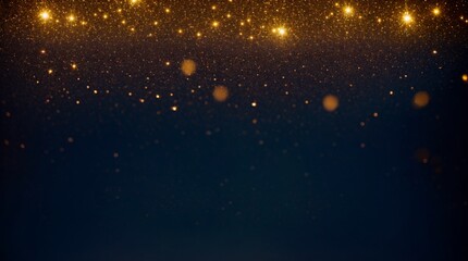 Gold sparkles shimmering against a deep blue background 