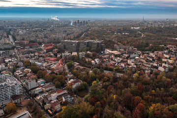 Aerial view over Bucharest Romania with autumnal colors 