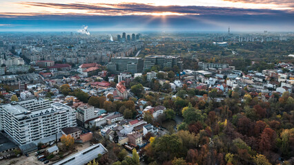 Aerial view over Bucharest Romania with autumnal colors 