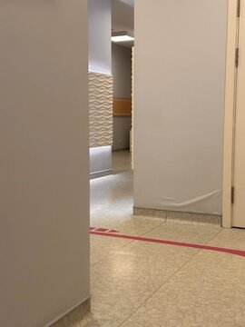 Empty hospital corridors. Light walls of empty clinic premises