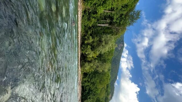 The Bolshaya Laba River. A mountain emerald river in a narrow, sunlit canyon. Bolshaya Laba River near the village of Psemen in Karachay-Cherkessia, Russia. Panoramic view. 4K
