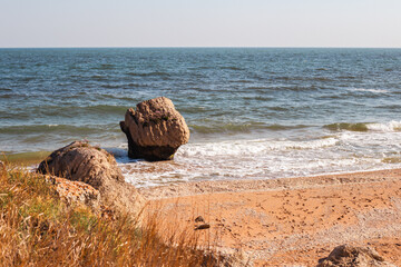 Seascape. A stone in the sea of an unusual shape. Crimea, General's beaches