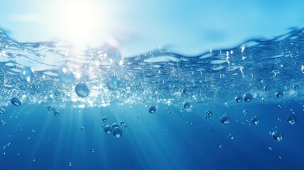 Blurry blue water surface with bubbles and splashes Nature background with sunlight