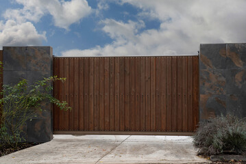 Automatic sliding gate with wooden picket