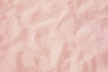 Selective focus of summer and holiday backgrounds concepts with pastel sand.