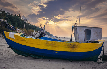 Fishing boat on a Baltic sea beach in Katy Rybackie village located on Vistula Spit, Poland