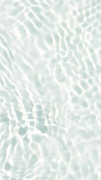 white transparent slow motion rippled water surface texture, fresh sunny background with copy space for beach vacation, body care and cosmetics