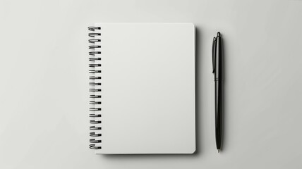 Blank open notebook with a sleek pen on a clean white background - obrazy, fototapety, plakaty