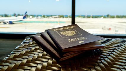 Passports and plane tickets at the airport before boarding the