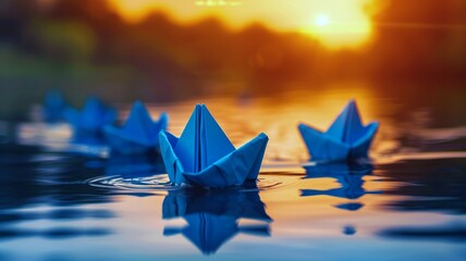 Paper boats on water surface during sunset symbolizing hope and tranquility