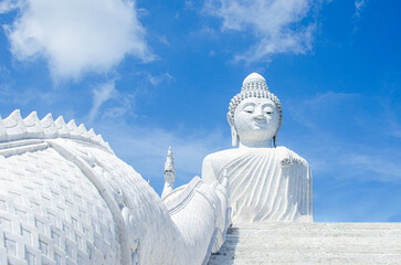 Naga stairs up to a Big Buddha on top of the Nakkerd Hills in Phuket, Thailand. - obrazy, fototapety, plakaty