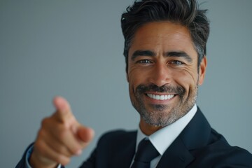 Close Up of happy Professional Businessman in Suit Pointing Forward with sunlight - obrazy, fototapety, plakaty