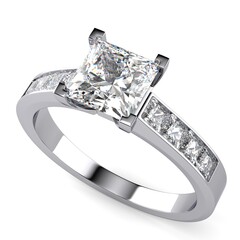 Diamond engagement ring, four prong set 2 carat princess cut main stone, shoulder channel setting with princess cut side stones, top view, isolated on white background.