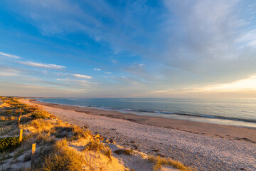 Henley Beach coastline with people at sunset, South Australia
