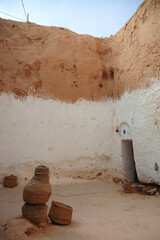 Courtyard of traditional Berber cave dwelling near Matmata city, Kebili Governorate, Tunisia