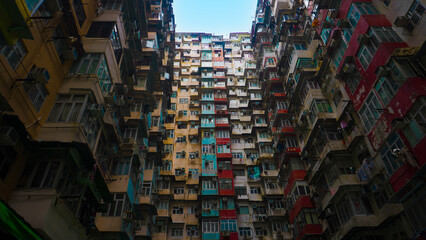 Yick Fat Building, Quarry Bay, Hong Kong: Combination of high old apartment, Famous landmark in Hong Kong Yick Fat building - obrazy, fototapety, plakaty