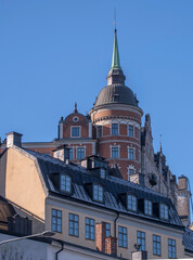 The house Laurinska huset with a brick tower in the district Mariaberget, a sunny winter day in...