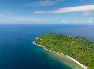 Fototapeta na wymiar Tropical seascape with blue sea and sandy beach in Cagbuli Island. El Nido, Philippines.