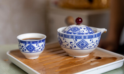 traditional chinese tea ceremony at home, with tea utensils