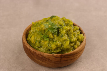 Guacamole in a Bowl, is an Avocado Based Dip, Spread, or Salad from Mexico.