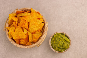 Tortilla or Corn Chips and Guacamole Sauce.