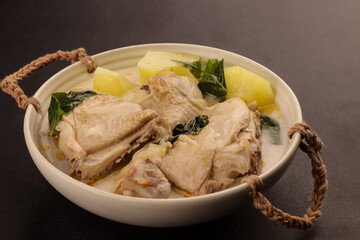 Chicken Halang Halang is Filipino Chicken Dish, Chicken Cooked in Coconut Milk with Lemongrass, Green Papaya, and Hot Pepper Leaves.