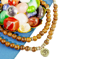 Crystals gemstones set with rosary beads on yoga mat on transparent background. Minerals for esoteric spiritual practice, Healing Crystal Ritual, Witchcraft, Relax Chakra. Reiki therapy, meditation