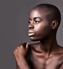 Thinking, makeup and black woman with lipstick, beauty and dermatology on grey studio background....