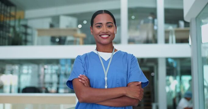 Surgeon, woman and arms crossed with face, smile and pride for career in healthcare at hospital. Doctor, nurse and person with confidence for wellness in clinic lobby for medical job in Costa Rica