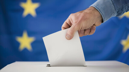 Hand casting a vote into a ballot box against the European Union flag backdrop.