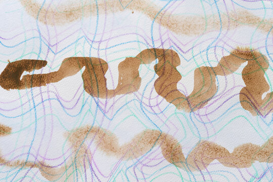 brown wavy and watery lines on paper with abstract grid pattern
